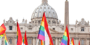Italian Arcigay gay rights association activists hold their flags in Rome during a demonstration in front of the Vatican, Sunday, Jan. 13, 2008, to remember Alfredo Ormando. Ormando, 39, from Palermo, Sicily, Italy, had set himself on fire in St. Peter's Square, Jan. 13, 1998, to protest against the anti-gay policy of the Roman Catholic church. (AP Photo/Angelo Perruolo)